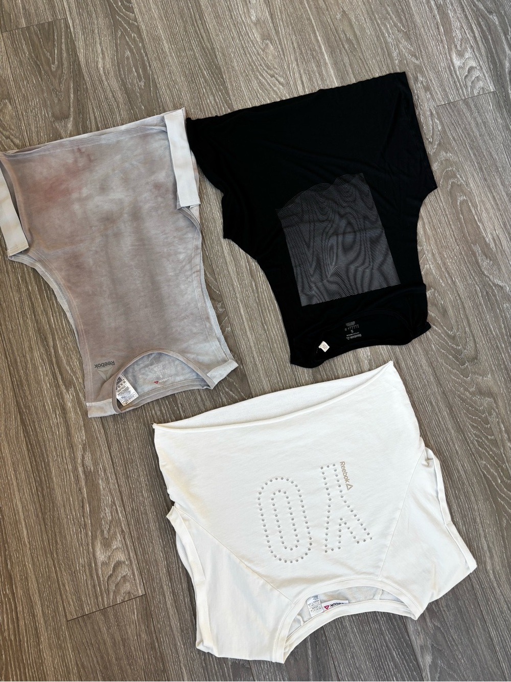 Bundle of Reebok White Studded Cropped Muscle Tee with Black and Gray Tanks
